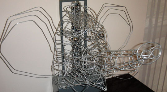 elephant rolling ball sculpture